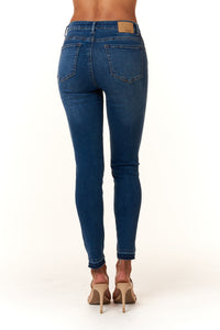 Tractr Jeans, High Rise skinny jeans with release hem in medium wash-Denim