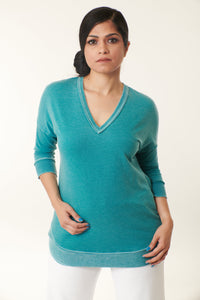 three quarters sleeve burn out knit pullover in turquoise-