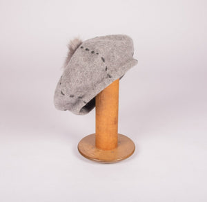 -Hatsembroidered wool beret with faux fur pom